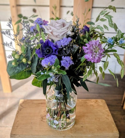 A vase of seasonal flower