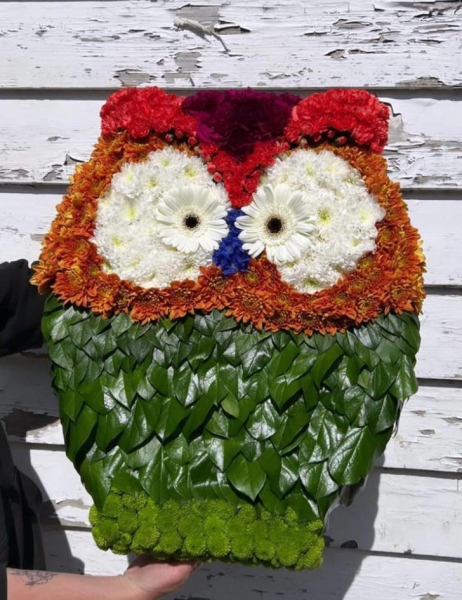 Floral owl tribute