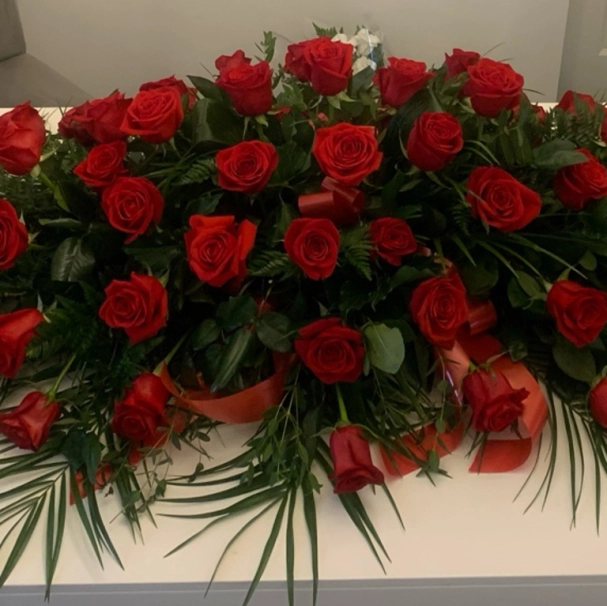 Red rose coffin spray