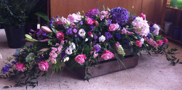 Pinkpurple coffin spray