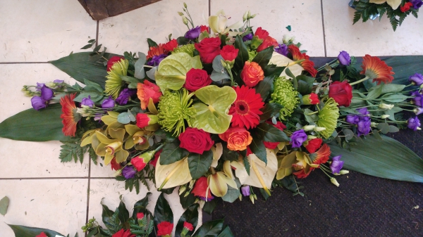 vibrant-casket-spray