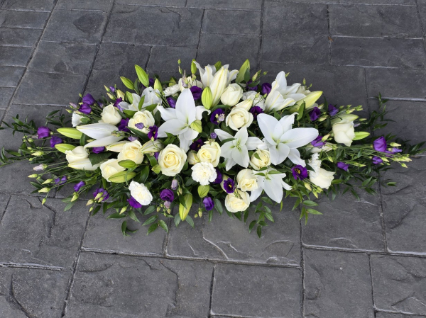 White with purple casket