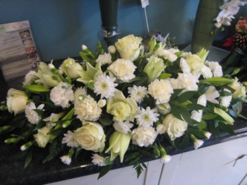 white-coffin-spray