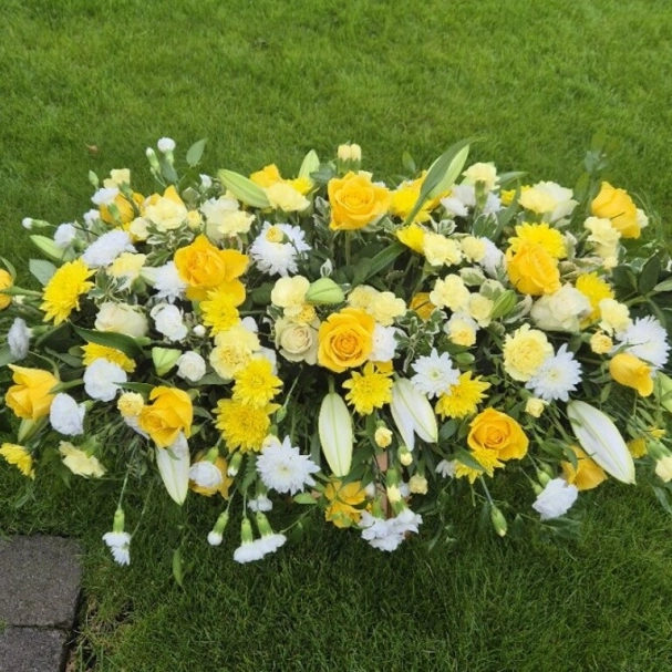 Yellow white coffin spray