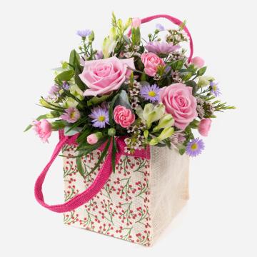 a-little-something-floral-arrangement-in-a-jute-gift-bag-1