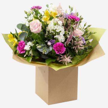 hidden-treasure-hand-tied-bouquet-with-pastel-flowers-in-water-1