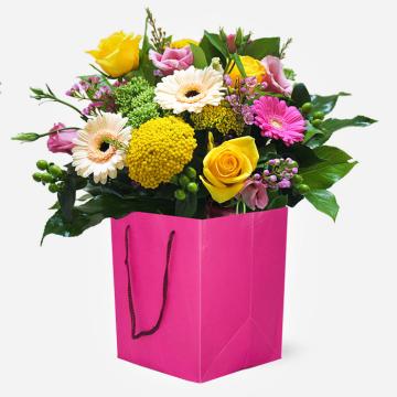 sugar-pop-hand-tied-bouquet-with-cerise-pink-and-yellow-flowers-1