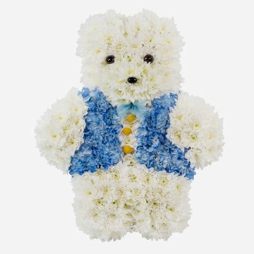 white-and-blue-teddy-bear-funeral-tribute-made-with-chrysanthemum-on-a-grey-background-1