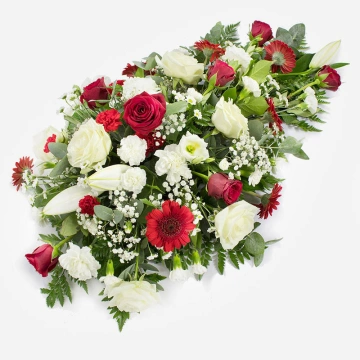 red-white-single-ended-spray-featuring-red-roses-white-roses-white-carnations-on-a-grey-background-1