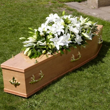 graceful-casket-spray-of-white-lilies-and-greenery-1