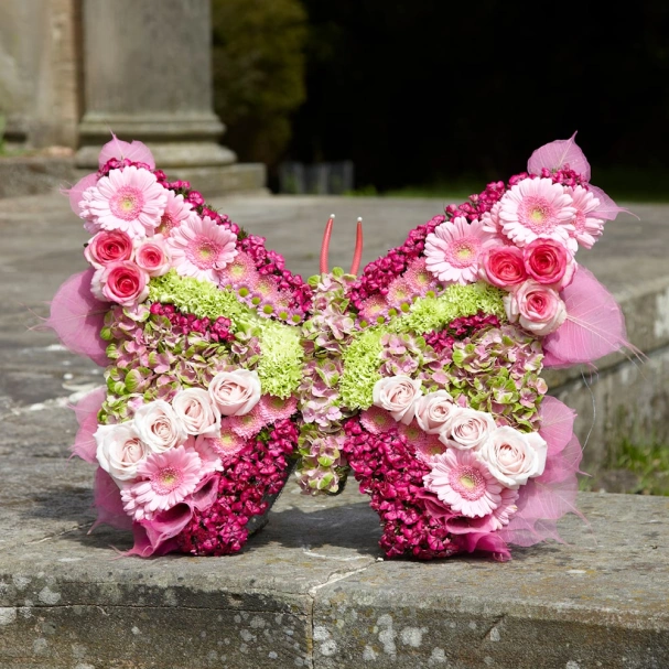 butterfly-tribute-with-pink-roses-and-green-chrysanthemums-1