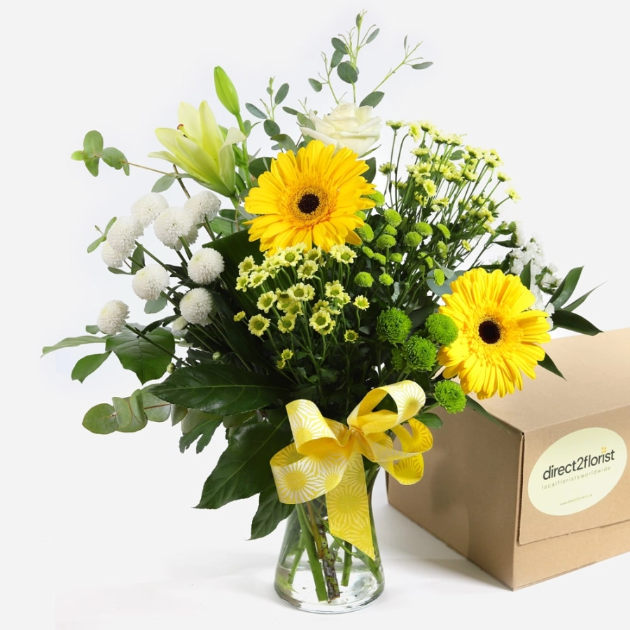 yellow-gerberas-white-roses-and-greenery-in-a-vase-with-a-yellow-ribbon-1