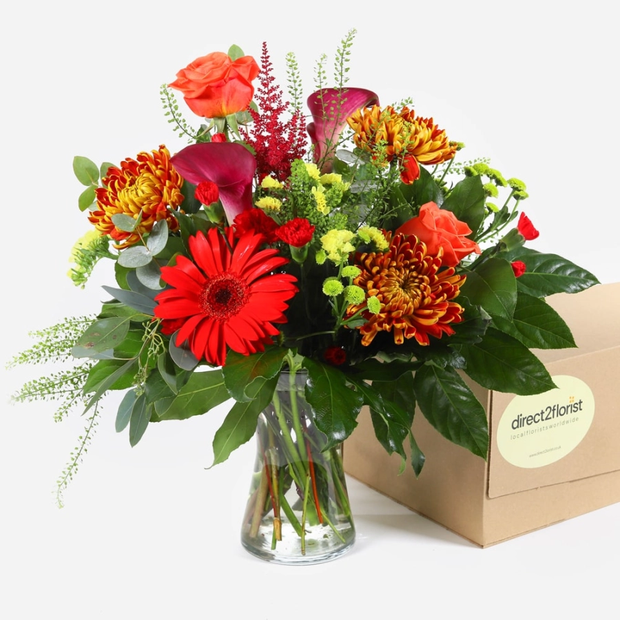 red-gerberas-orange-roses-and-calla-lilies-in-a-vase-1