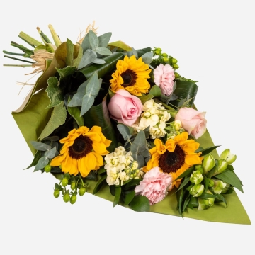 sunflowers-pink-roses-and-carnations-wrapped-in-green-paper-bouquet-1