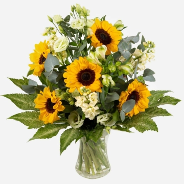 cheerful-sunflower-and-white-bloom-arrangement-in-a-clear-glass-vase-2