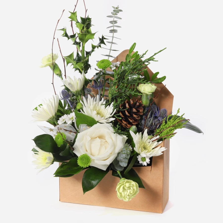 Elegant winter arrangement presented in a rustic letterbox-style gift box